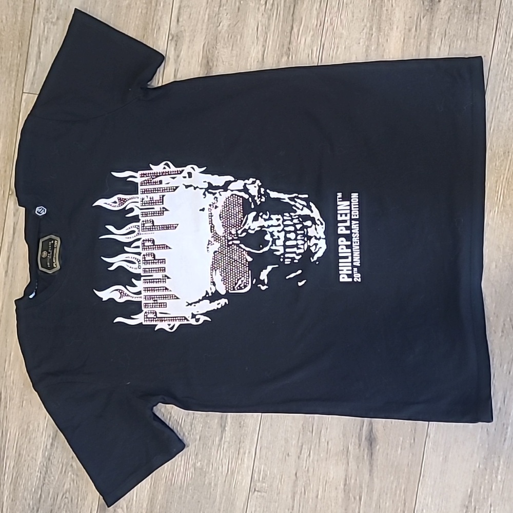 Philipp Plein 20th Ann edition black cotton featuring a flaming Rhinestone Skull